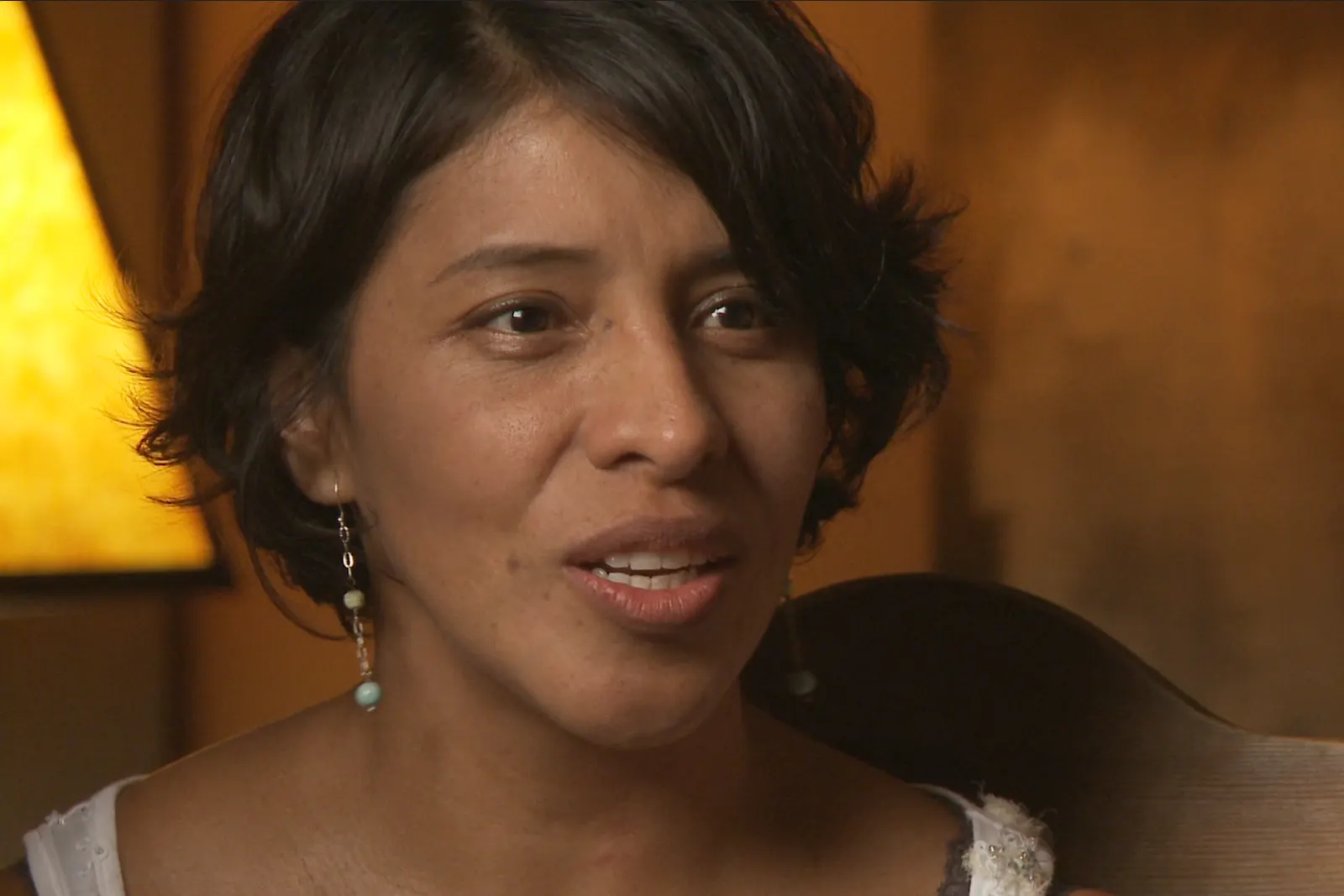 Carmen in a warm interview close-up